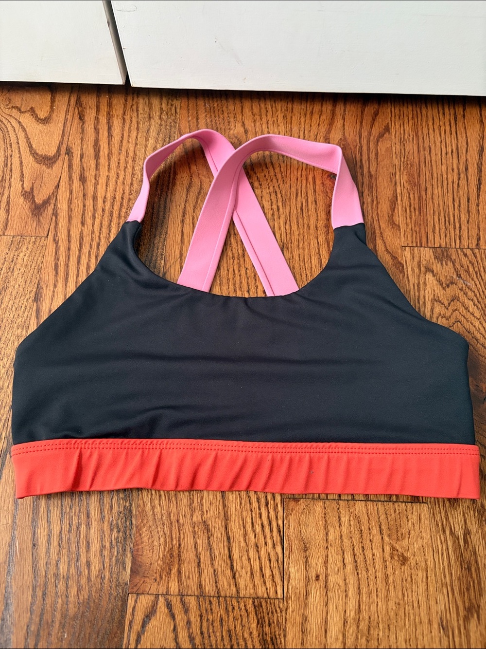 Wilo Women’s Black Sports Bra Pink Straps and Coral Band Size Medium